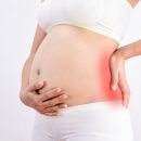 Durerea de spate în sarcină – cauze și soluții